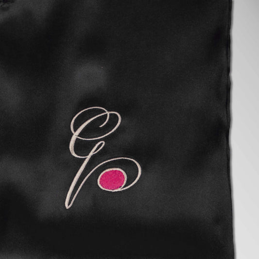 Pillowsforeplay - Bolero - Pink Slip - Close up showing the high quality finish and pink spot #variant:slip-color-black-satin-slip